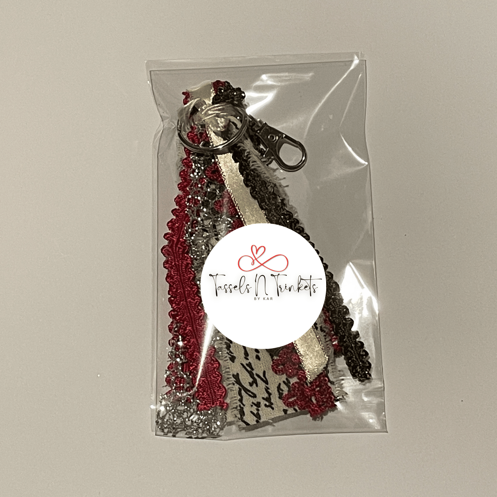 Red Tassel keychain in package