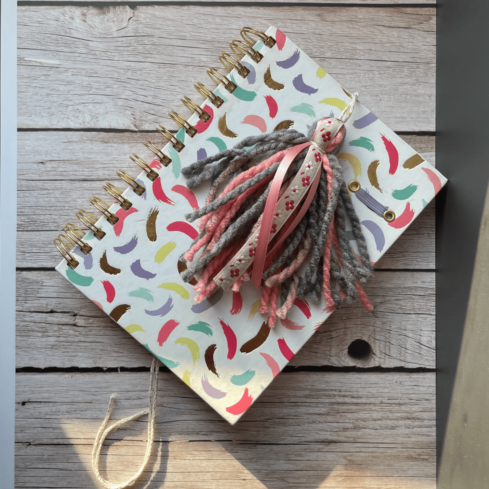 Pink Bookmark on journal