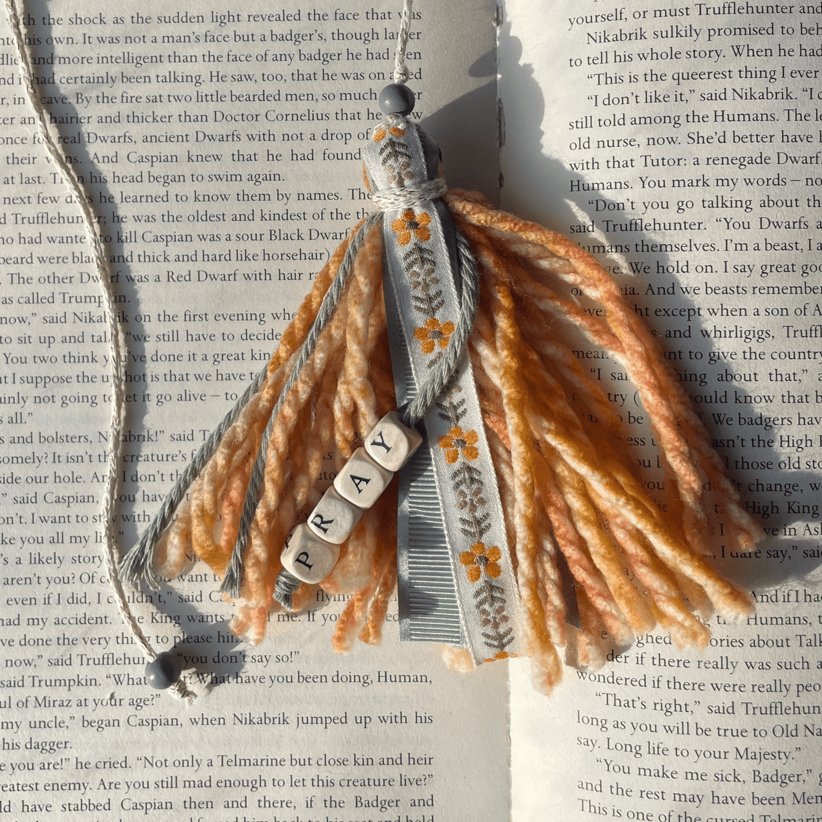 Pray Bookmark Tassel on book