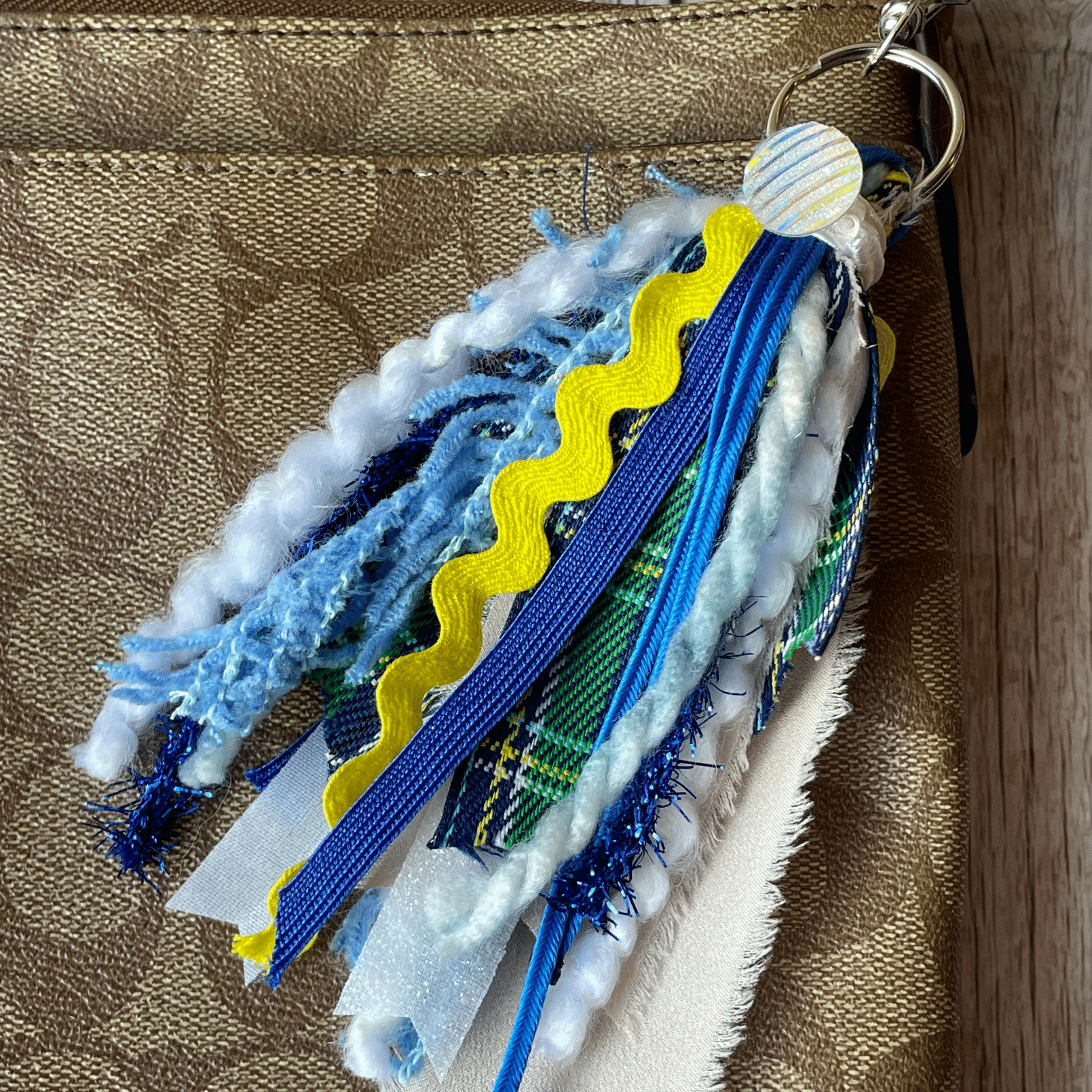 Blue Yellow keychain on purse