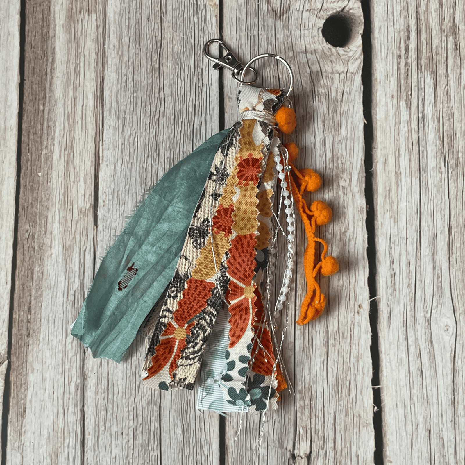 Orange and floral tassel keychain